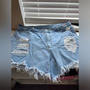 Plus sized denim distressed shorts